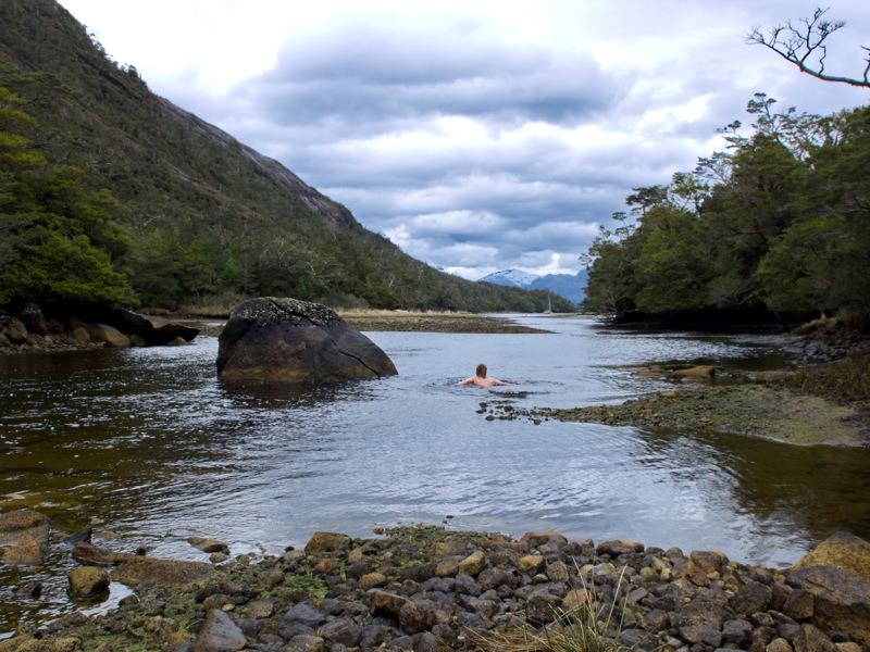 Susanne skinny dipping in Estero Dock - Patagonia photo copyright Lars Hellman taken at Ocean Cruising Club and featuring the Cruising Yacht class