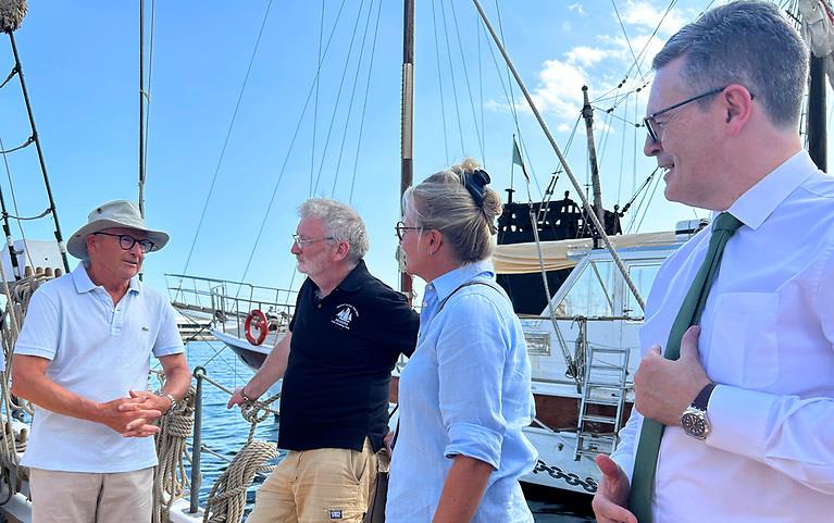 Organising Chairman Seamus O'Connor (left) with Peter Crowley, Louisa Blandy-Moreau of Madeira, and HE Ralph Victory, Irish Ambassador, aboard Ilen- Saoirse Circumnavigation centenary celebration photo copyright Aoife Nolan taken at Ocean Cruising Club and featuring the Cruising Yacht class