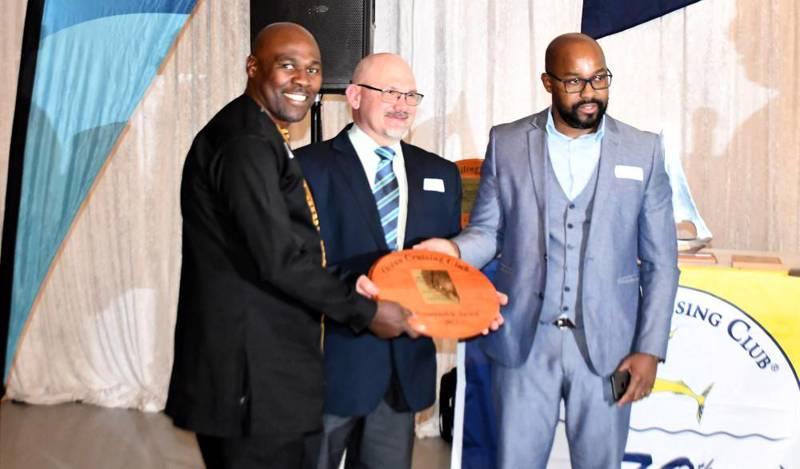 Mr Sobantu Tilayi, SAMSA Chief Operations Officer; Mr Almar Schutte, acting Chief of the MRCC and Mr Donald Ratshibvumo receiving an Ocean Cruising Club Seamanship 2022 during an awards event at the Cape Royal Yacht Club in Cape Town in October 2023 photo copyright Daria Blackwell taken at Ocean Cruising Club and featuring the Cruising Yacht class