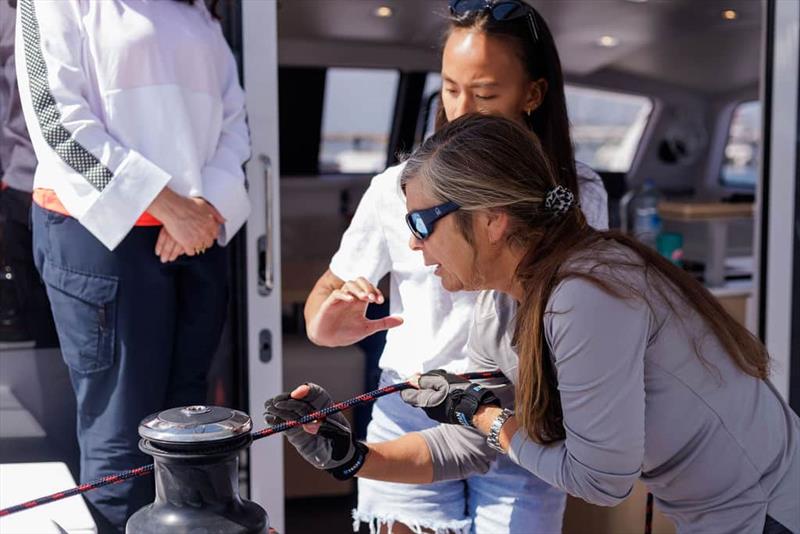 Nikki Henderson and women on board photo copyright Outremer Catamarans taken at  and featuring the Cruising Yacht class