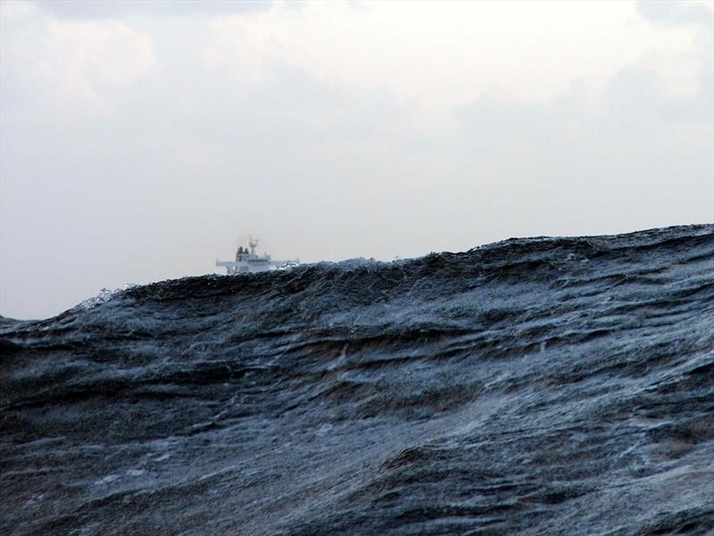 In heavy weather in the shipping lanes off Japan; the bridge of a 150,000 ton tanker is barely visible - photo © Nick and Jenny Coghlan - s/v Bosun Bird