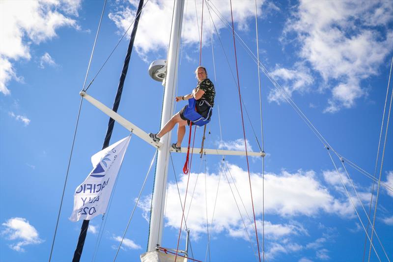 Emily Rudkin - our fleet rigger up the mast - Pacific Rally 2025 photo copyright Jacob Fewtrell Media taken at  and featuring the Cruising Yacht class