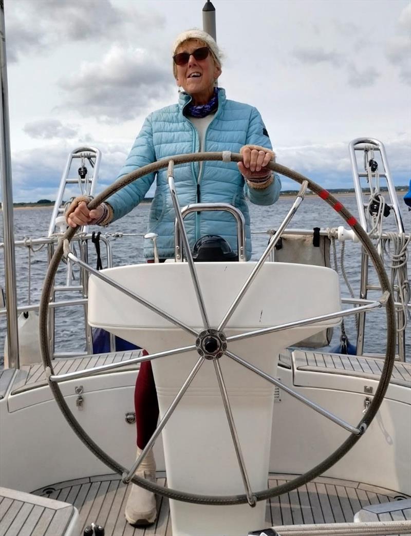 Jackie Gebhard at the wheel photo copyright Gebhard family taken at  and featuring the Cruising Yacht class