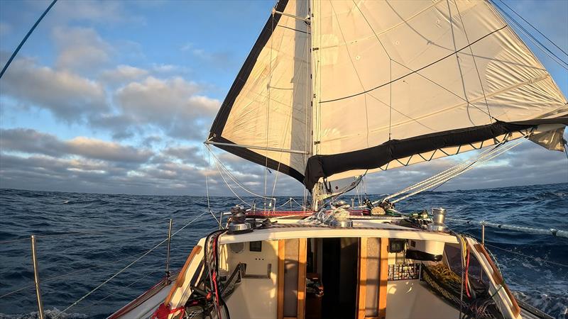Poled out headsail in the Indian Ocean - Blue Moon II circumnavigation - photo © Tristan Gourlay