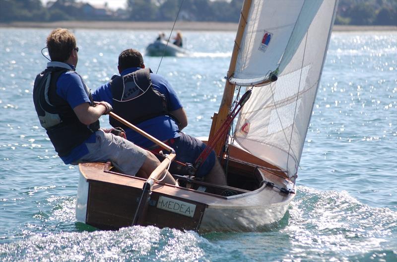 Back in the Golden era of dinghy racing in the 1960s, the 12m Sharpies were a strong fleet on Chichester harbour, so it was great to see 3 of them back racing at the Bosham Classic Boat Revival 2018 photo copyright Dougal Henshall taken at Bosham Sailing Club and featuring the Classic & Vintage Dinghy class