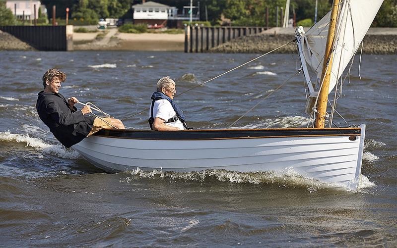 Hinnerk and his late father enjoying the new, smaller boat they built in the lounge room photo copyright Nico Krauss taken at  and featuring the Classic & Vintage Dinghy class