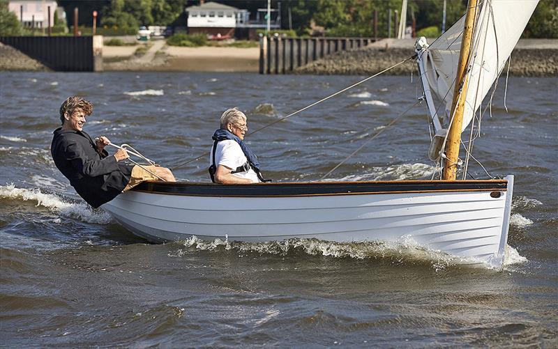 Hinnerk and his late father enjoying the new, smaller boat they built in the lounge room photo copyright Nico Krauss taken at  and featuring the Classic & Vintage Dinghy class