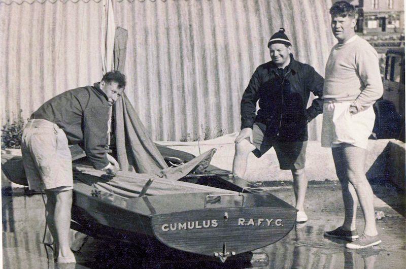 Ian Proctor bending over his Merlin Rocket with Beecher Moore (in the white shorts) watching on photo copyright MROA taken at  and featuring the Classic & Vintage Dinghy class