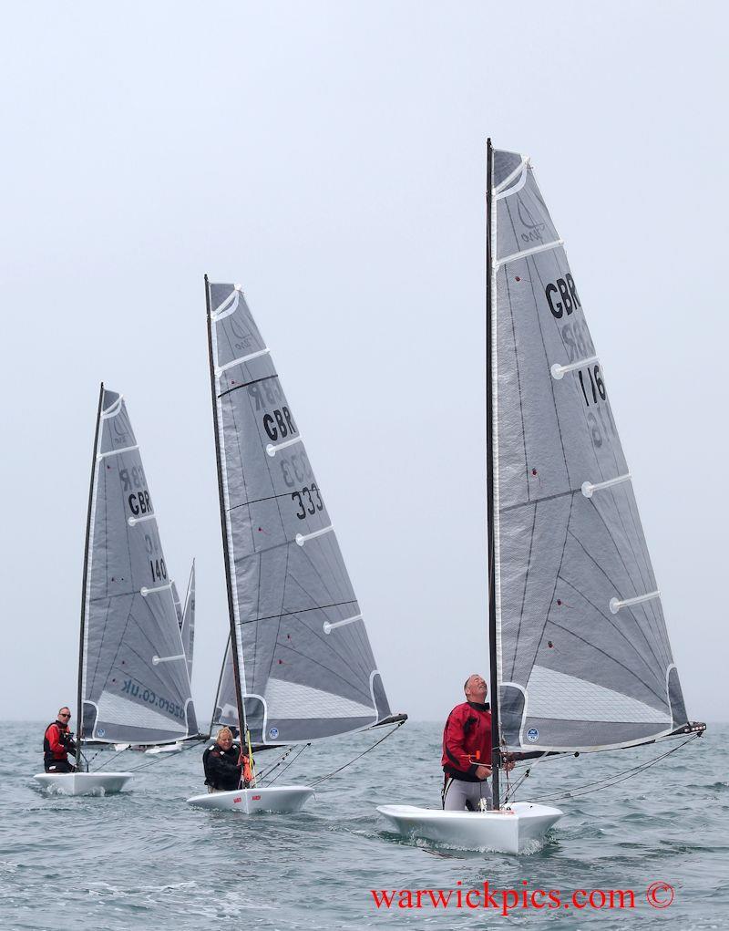 Tyler Harmsworth (second overall) being chased by 'Zippy' and Martin Walker in the D-Zero open meeting at Shoreham photo copyright Warwick Baker / www.warwickpics.com taken at Shoreham Sailing Club and featuring the D-Zero class