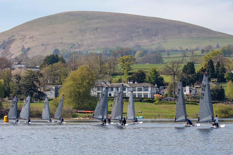 Down the run in Race 3 at the Ullswater Magic Marine Daffodil Regatta 2026 photo copyright Tim Olin / www.olinphoto.co.uk taken at Ullswater Yacht Club and featuring the D-Zero class