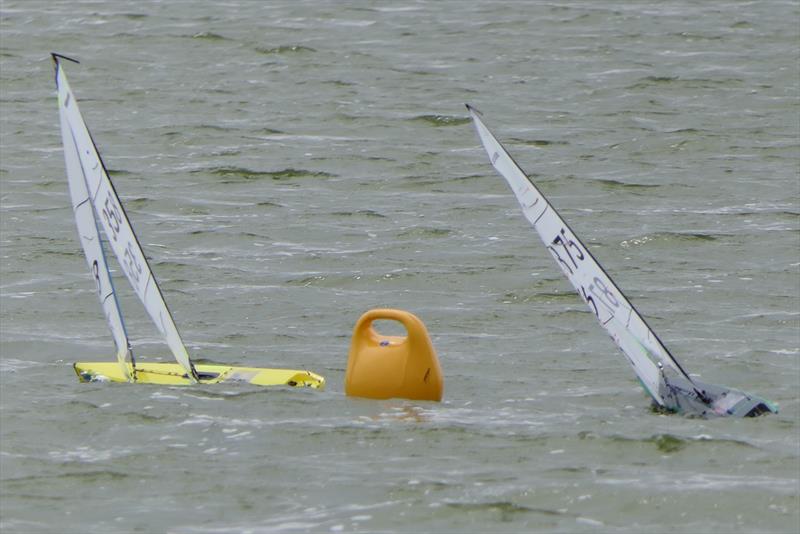 Mike Brand chasing Dave Adams round the weather mark - DF95 Summer Series event 3 at Barton's Point photo copyright Alan Houndsell taken at East Kent Radio Sailing Club and featuring the DF95 class