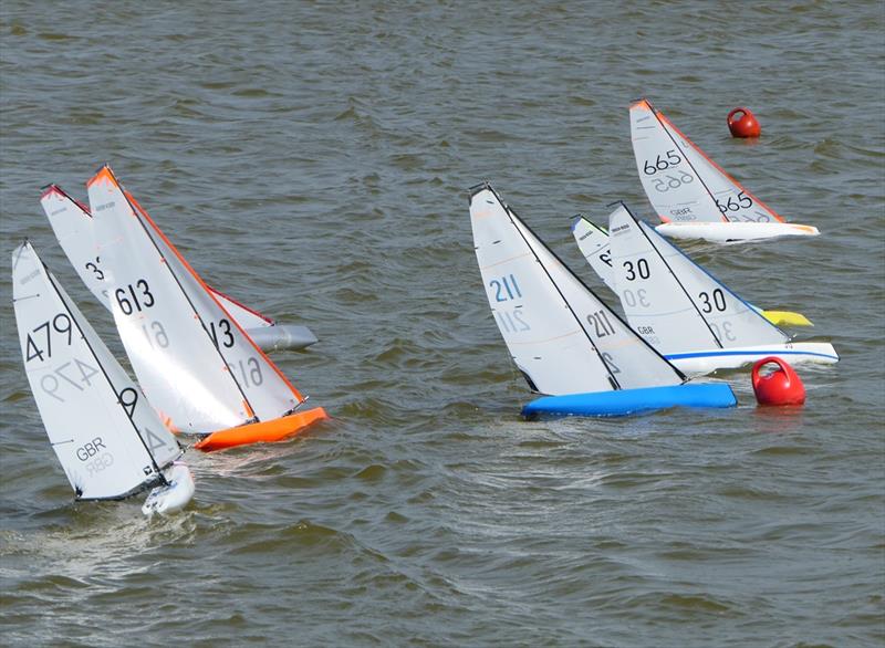 Adrian Tomlinson (30) gets away well with Peter Jackson (211) to windward at the start on DF95 Spring Series at Barton's Point week 8 photo copyright Alan Hounsell taken at East Kent Radio Sailing Club and featuring the DF95 class