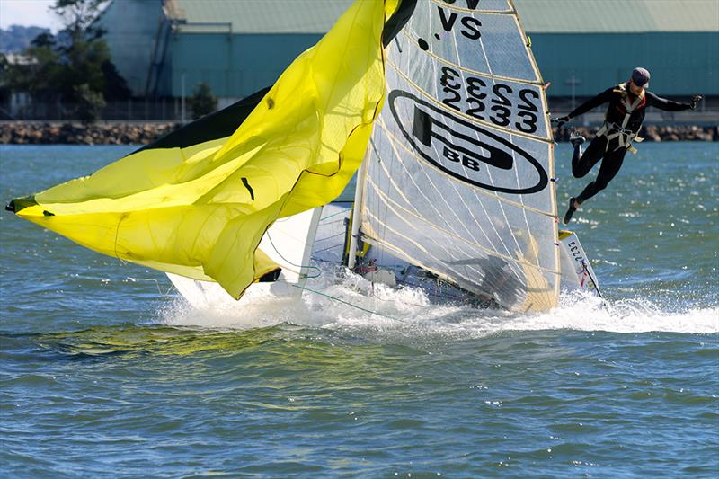 Capsize during the Cock of the Harbour during SailFest Newcastle Regatta photo copyright Mark Rothfield taken at Newcastle Cruising Yacht Club and featuring the Dinghy class