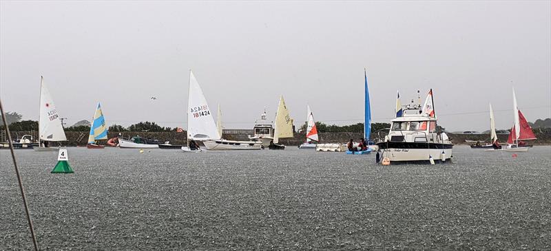 A biblical downpour ahead of the Four Lakes Race photo copyright Mark Jardine taken at Keyhaven Yacht Club and featuring the Dinghy class