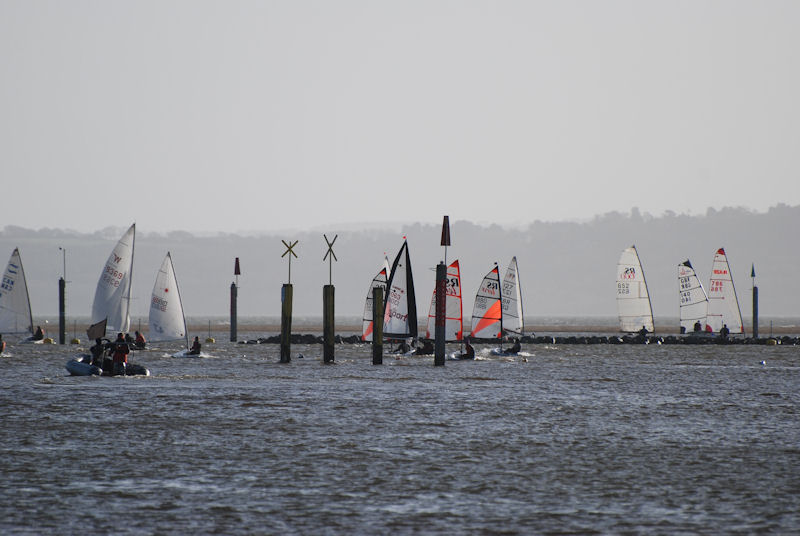Stuart Watson leads the fleet in his Blaze during race 4 of the Lymington Town Perisher Series photo copyright Alastair Beeton taken at Lymington Town Sailing Club and featuring the Dinghy class