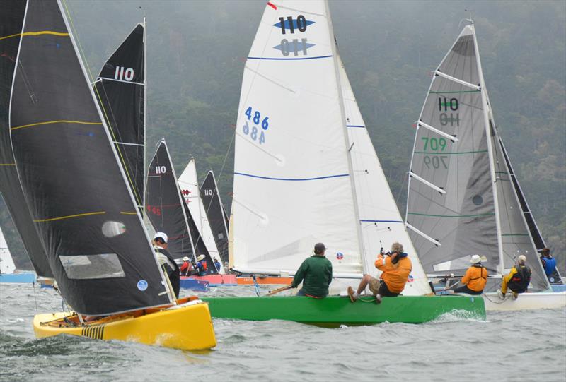 The 110 fleet celebrates color photo copyright Kimball Livingston taken at Inverness Yacht Club and featuring the Dinghy class