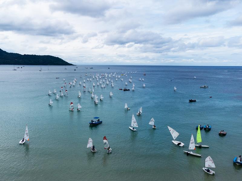 Phuket King's Cup 2022: the dinghy fleet heads for the race course photo copyright Guy Nowell / Phuket King's Cup taken at Phuket Yacht Club and featuring the Dinghy class