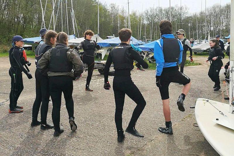 A new Tik-Tok dance? Or just warm-ups before sailing? - Derbyshire Youth Sailing starts the 2023 season at Burton photo copyright Joanne Hill taken at Burton Sailing Club and featuring the Dinghy class