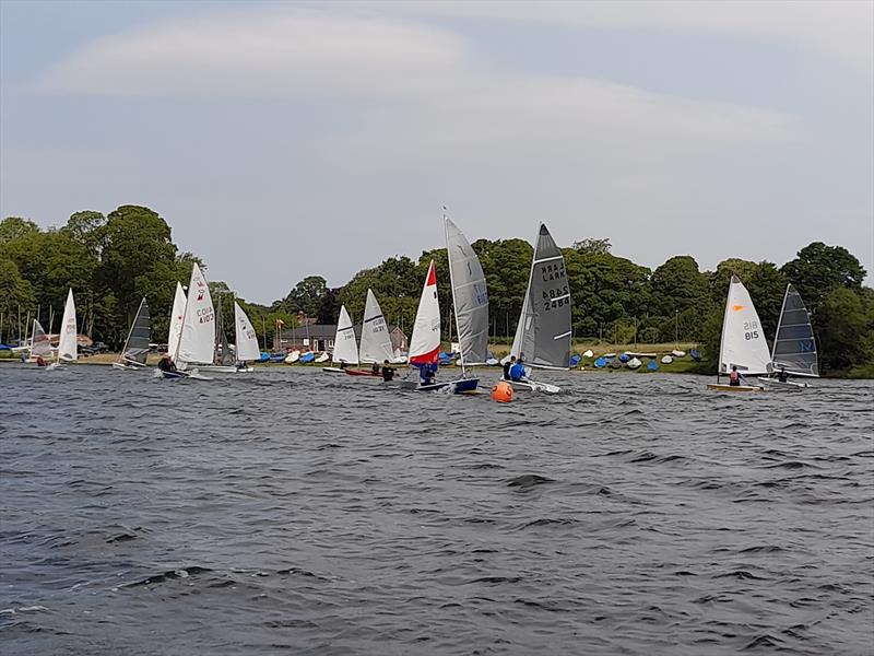 Setting up for the start during the Border Counties Midweek Sailing Series at Shropshire Sailing Club photo copyright Keith Marshall taken at Shropshire Sailing Club and featuring the Dinghy class