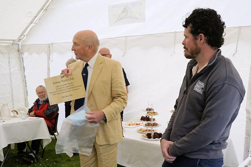 Ian Purkis, project leader, shows the brass plate commemorating the opening - Solway YC opens new fully accessible disabled clubhouse - photo © Finlay Train