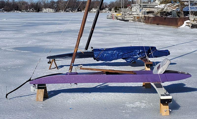 Repairing the mast step and steering column of a DN Ice Yacht - chocked up - photo © Gregg Bugala