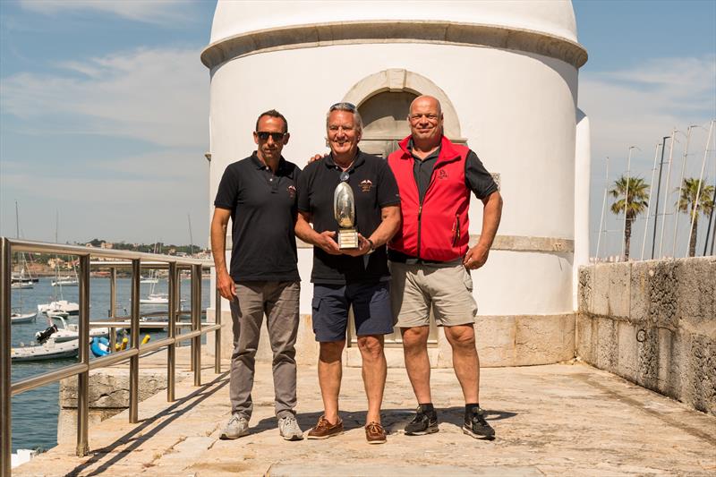 Dragon HM King Juan Carlos Trophy in Cascais - Stavros trophy winners Jean Rathsack, Diogo Pereira & Micheal Lipp photo copyright Assunção Castelo Branco taken at Clube Naval de Cascais and featuring the Dragon class