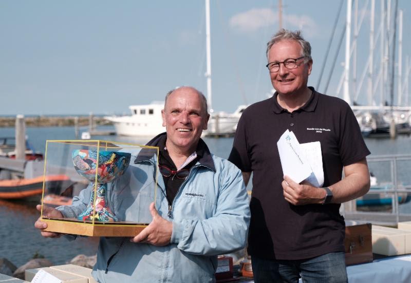 John den Engelsman with the Silver Cup Trophy at the 2019 Yanmar Dragon Gold Cup - photo © Eric van den Bandt