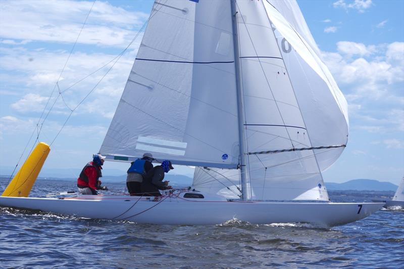 Karabos IX rounds the windward mark, with her crew raising the spinnaker - 2024 International Dragon Class Prince Philip Cup day 1 photo copyright Jeanette Severs taken at Metung Yacht Club and featuring the Dragon class