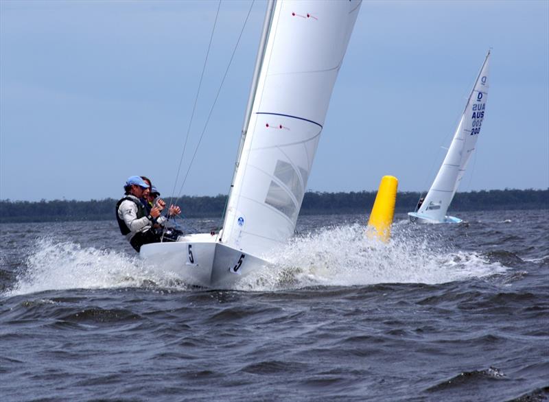 Gordon sails around the windward mark ahead of Riga photo copyright Jeanette Severs taken at Metung Yacht Club and featuring the Dragon class