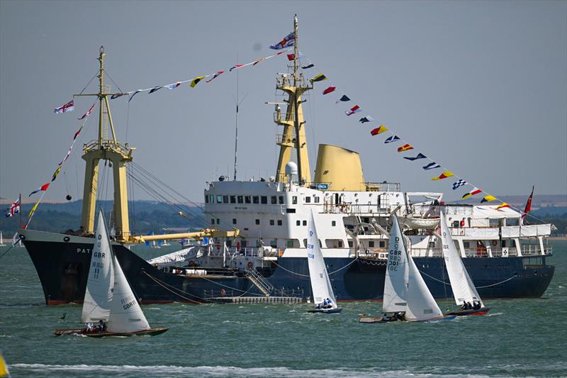 With the ‘Patricia' as the backdrop, the Solent is alive with racing yachts - North Sails Cowes Week Day 2 - photo © Martin Allen Photography