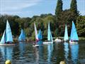 Busy River: A rowing four and coach boat cruise through the start line on Sunday at the Minima Regatta 2023 © Rob Mayley