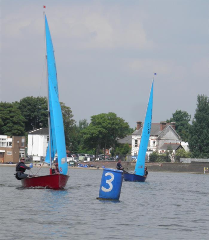 Karen Alexander and Jonathan Woodward (red boat) and Phil Harrison and Will Eltringham (blue boat)  at the Enterprise Double Chine series at Midland photo copyright Trevor Pearson taken at Midland Sailing Club and featuring the Enterprise class