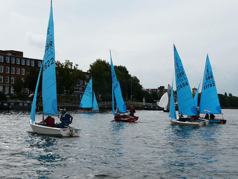 The Enterprise pack close together after the 3rd race start on Sunday morning. Alex Cane, against far bank, led at this point during the Minima Regatta 2017 photo copyright Rob Mayley taken at Minima Yacht Club and featuring the Enterprise class