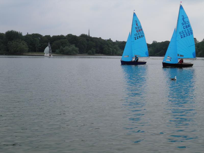 Close racing between Paul & Jan and Martin & Rebecca during the 2023 Enterprise Midland Area Double Chine Series at Midland SC photo copyright Kevin Hopkins taken at Midland Sailing Club and featuring the Enterprise class