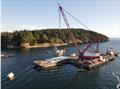 Aleutian Isle being lifted out of the water and onto the barge on September 21, 2022