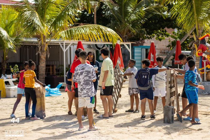 The annual beach clean up of Kim Sha Beach collected a record 1,224.5 lbs of garbage from the beach by volunteer youth - photo © Digital Island