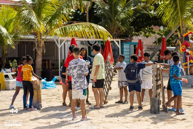 The annual beach clean up of Kim Sha Beach collected a record 1,224.5 lbs of garbage from the beach by volunteer youth photo copyright Digital Island taken at Sint Maarten Yacht Club and featuring the Environment class