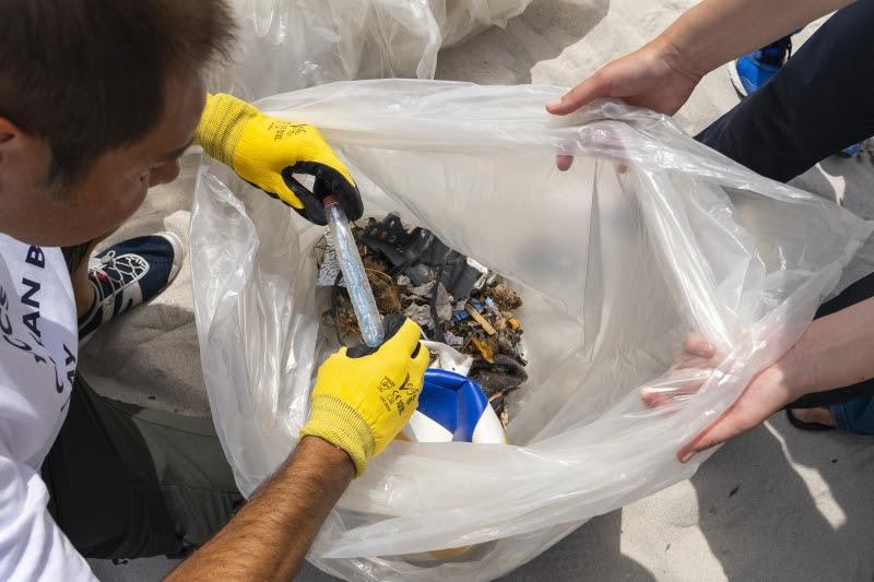 Researcher Andrea de Lucia selects items of rubbish to show to the participants towards the end of the morning photo copyright YCCS / Daniele Macis taken at Yacht Club Costa Smeralda and featuring the Environment class