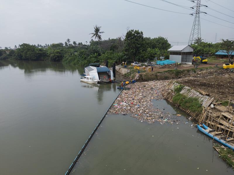 An Ocean Cleanup Interceptor at work in Jakarta photo copyright The Ocean Cleanup taken at Alice River Anglers Club and featuring the Environment class