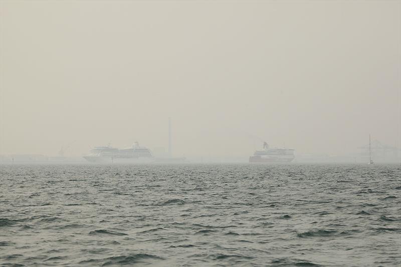 A cruise liner and the Spirit of Tasmania demonstrate just how poor the visibility can get on day 2 of the 2020 Etchells Australian Championship photo copyright John Curnow taken at Royal Brighton Yacht Club and featuring the Etchells class