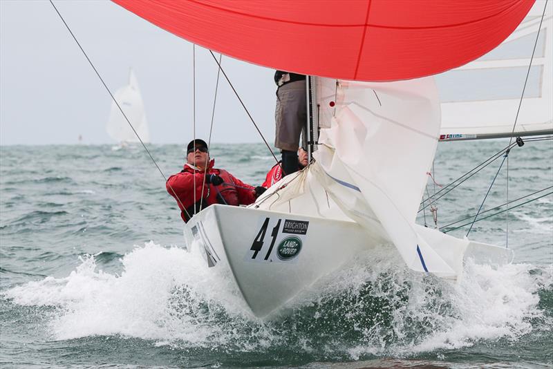 The crew from Men's shirts, Short Skirts enjoy catching a wave photo copyright Alex McKinnon Photography taken at Royal Brighton Yacht Club and featuring the Etchells class