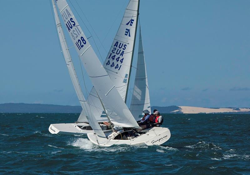 Fumanchu and Surprise, with Moreton Island as a backdrop photo copyright John Curnow taken at Royal Queensland Yacht Squadron and featuring the Etchells class