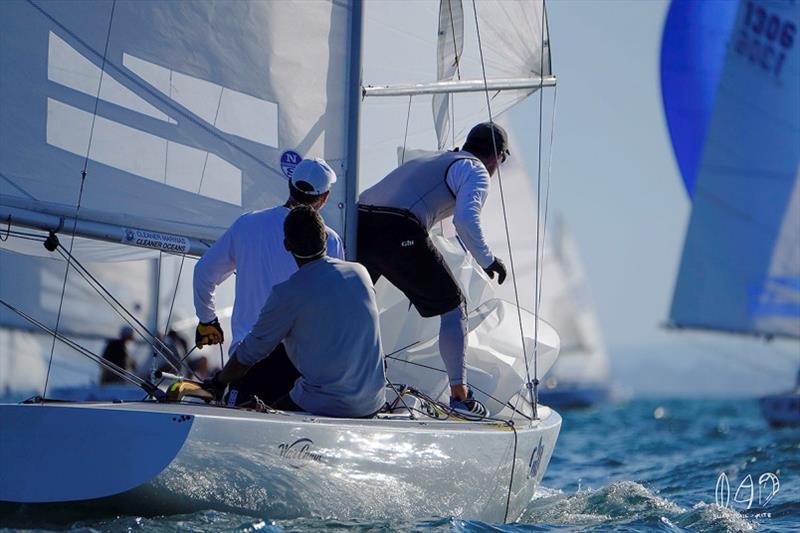 Working hard on War Canoe from the USA photo copyright Mitchell Pearson / SurfSailKite taken at Royal Queensland Yacht Squadron and featuring the Etchells class