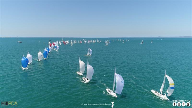 The fleet rounding the top mark in race 3 - 2018 Etchells World Championship - Day 3 photo copyright Nic Douglass / www.AdventuresofaSailorGirl.com taken at Royal Queensland Yacht Squadron and featuring the Etchells class