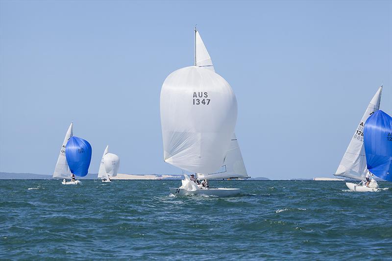 Part of the fleet with Moreton Island as the backdrop on day 4 of the Etchells Australian Championship photo copyright John Curnow taken at Royal Queensland Yacht Squadron and featuring the Etchells class