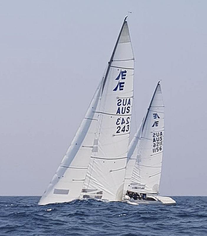 Grape Juice, (Wayne Kirby, Paul Harris, and Damien Williams) with Fast Eddy (AUS 1156) in the confused seaway photo copyright Southport Yacht Club taken at  and featuring the Etchells class