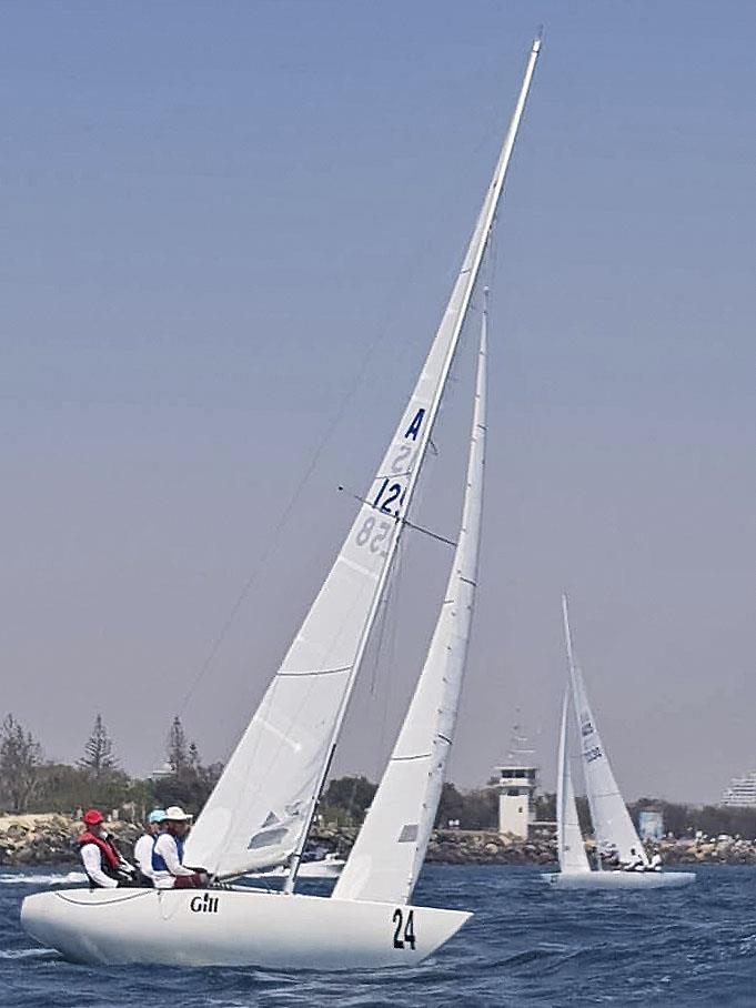 Tacking out the Gold Coast Seaway to go racing photo copyright Southport Yacht Club taken at  and featuring the Etchells class