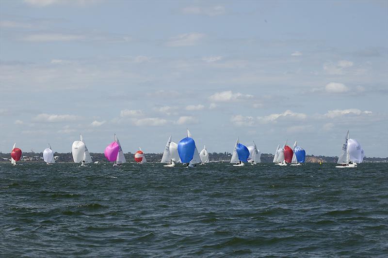 Part of the fleet heading back downhill with Black Rock in the background. - photo © John Curnow