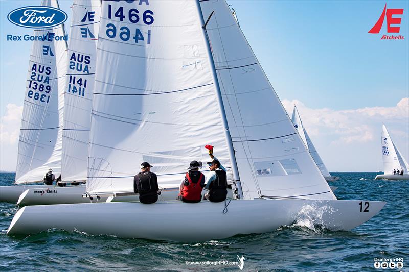 Haines on board Tango flags an incident at the start of Race 4 - Etchells Victorian State Championship 2022 photo copyright Nic Douglass @sailorgirlhq taken at Royal Geelong Yacht Club and featuring the Etchells class