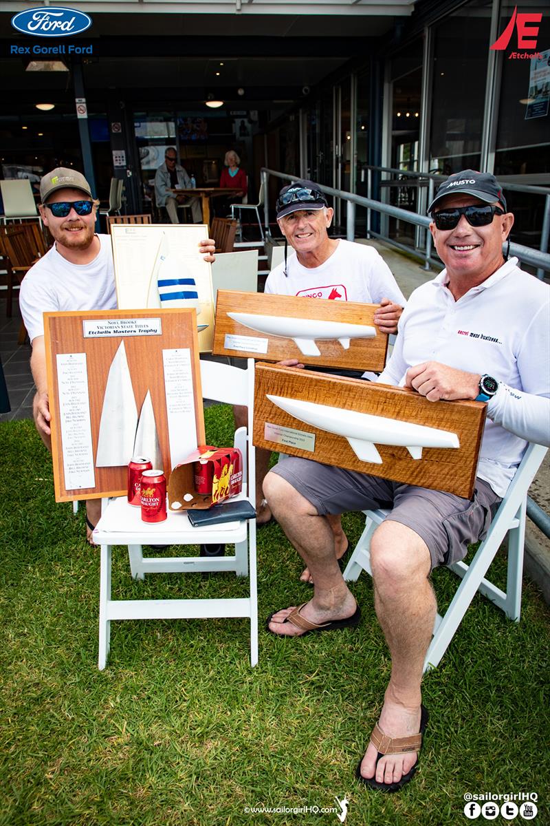 Shoulda Gone Left with their plethora of trophies - Etchells Victorian State Championship 2022 photo copyright Nic Douglass @sailorgirlhq taken at Royal Geelong Yacht Club and featuring the Etchells class